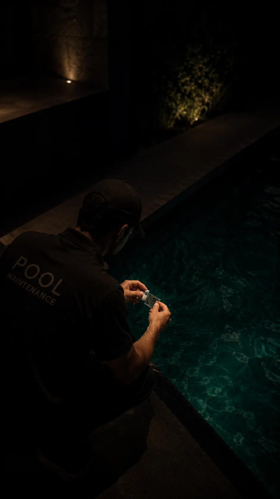 Al Kahaf technician carrying out scheduled pool maintenance in Bahrain